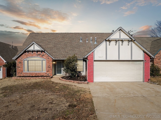 view of front of home with a garage