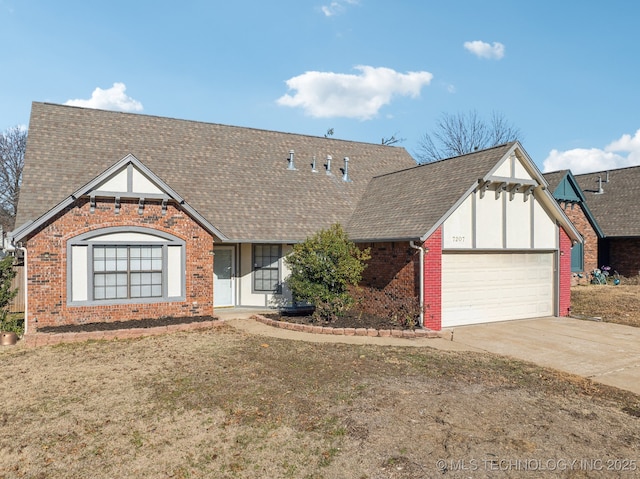 view of front of house with a garage and a front yard