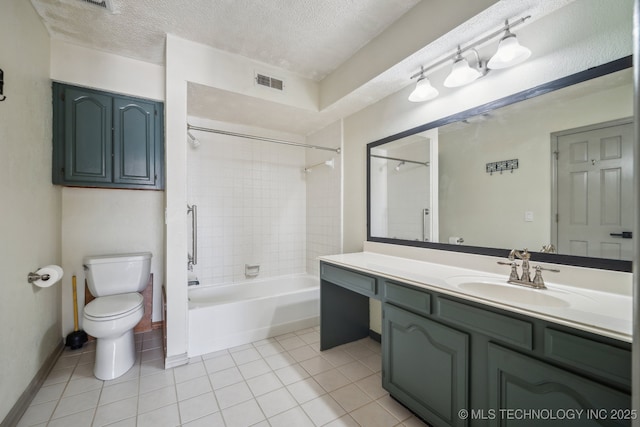 full bathroom featuring visible vents, toilet, vanity, tile patterned floors, and a textured ceiling