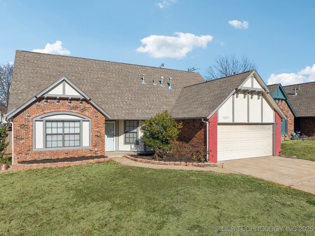 view of front facade with a garage and a front yard