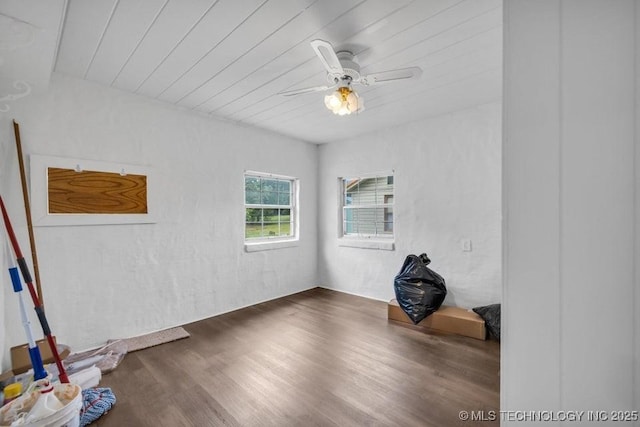 unfurnished room with ceiling fan, wooden ceiling, and hardwood / wood-style flooring