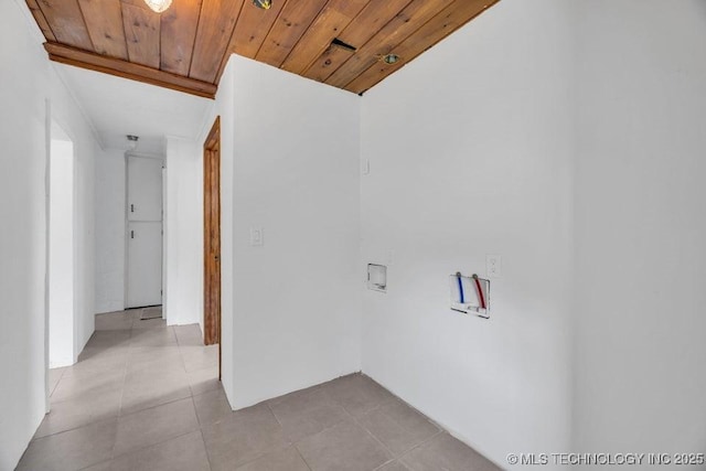 corridor featuring light tile patterned floors and wooden ceiling