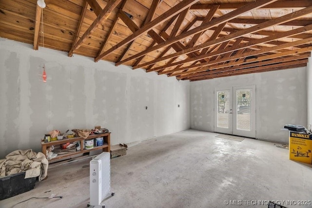 basement featuring wooden ceiling and french doors