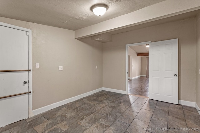 interior space featuring a textured ceiling