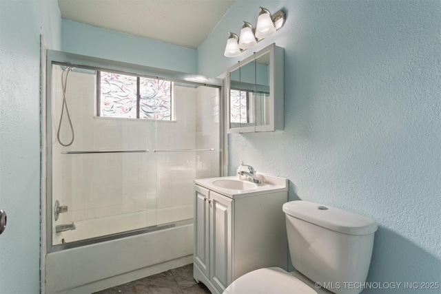 full bathroom featuring toilet, tile patterned flooring, enclosed tub / shower combo, and vanity