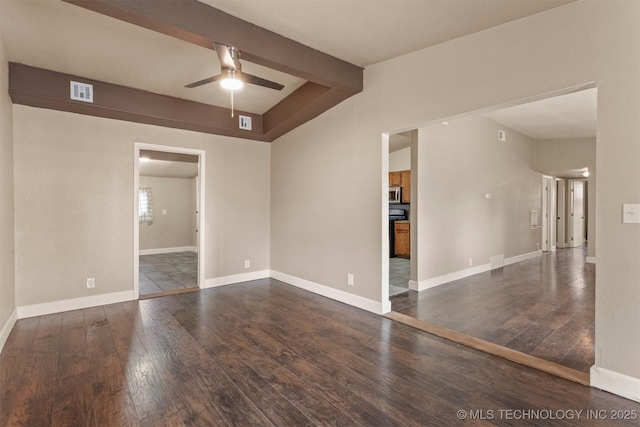 unfurnished room featuring ceiling fan and dark hardwood / wood-style floors