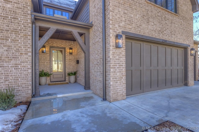 entrance to property featuring a garage