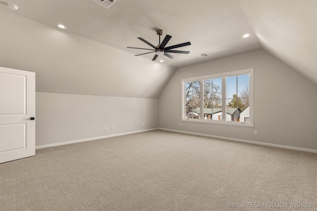 bonus room with carpet floors, ceiling fan, and lofted ceiling