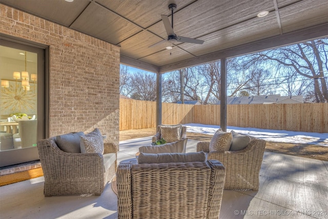 view of patio featuring ceiling fan