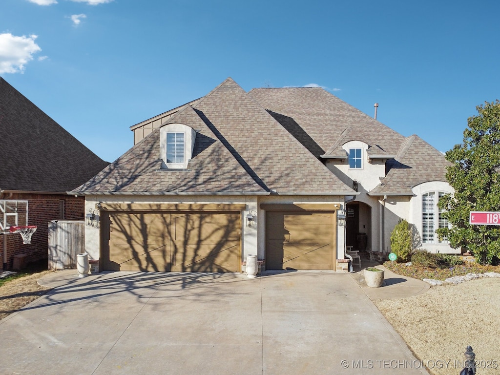 view of french country style house