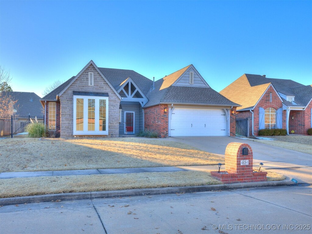 view of front of house featuring a garage and french doors