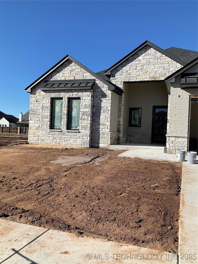 view of front of house featuring a patio area