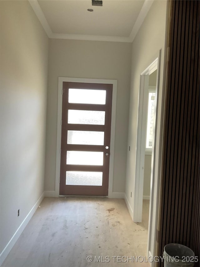 entryway with crown molding