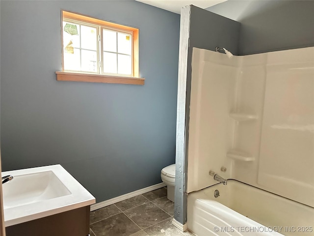 full bathroom featuring shower / washtub combination, vanity, and toilet