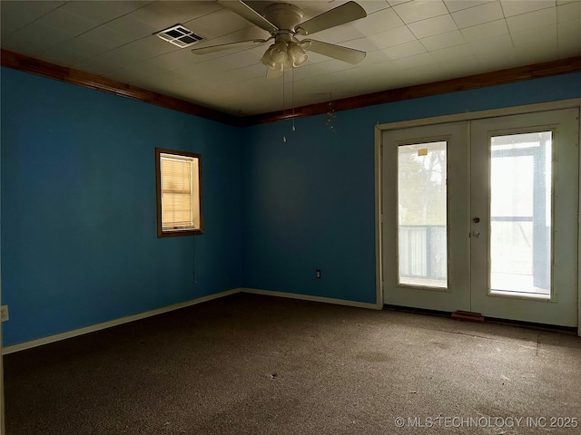 unfurnished room with ceiling fan, carpet flooring, and french doors