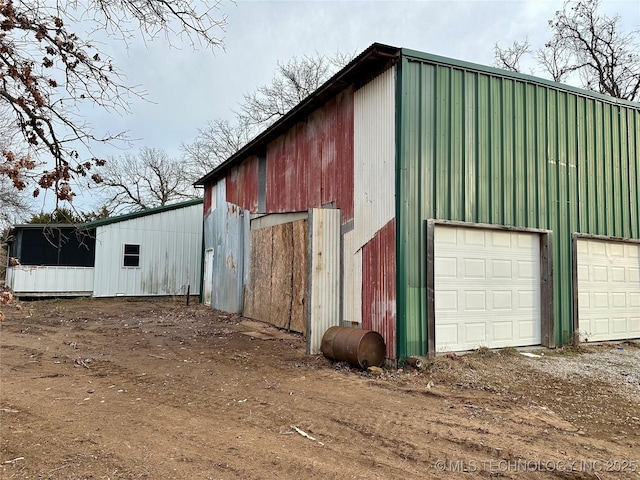 view of outdoor structure with a garage