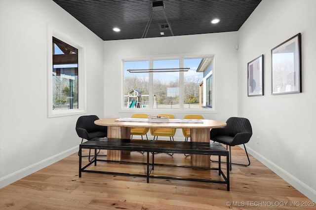 dining space featuring light hardwood / wood-style flooring