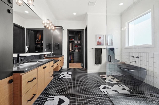 bathroom featuring a shower with shower door, tile patterned floors, a chandelier, ornamental molding, and vanity