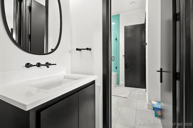 bathroom with vanity and tile patterned flooring