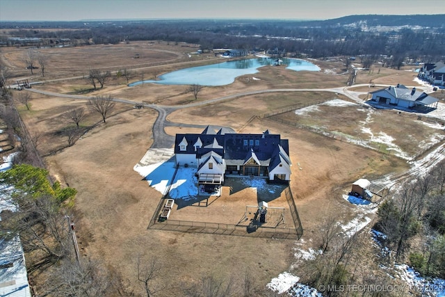 birds eye view of property featuring a water view