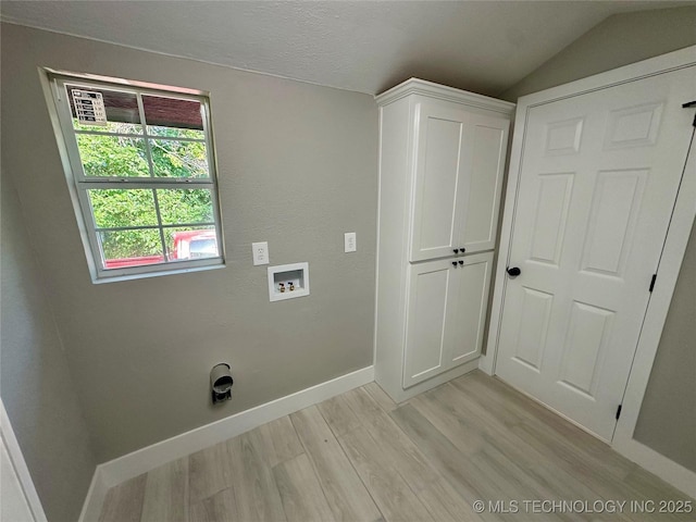 laundry room with light hardwood / wood-style floors and hookup for a washing machine