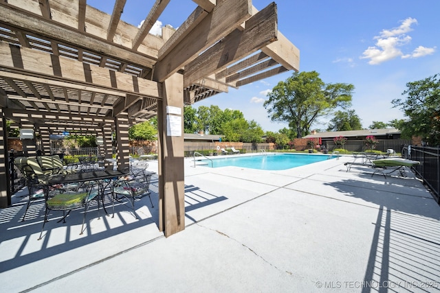 view of swimming pool with a pergola and a patio