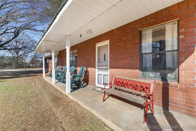 view of patio featuring a porch