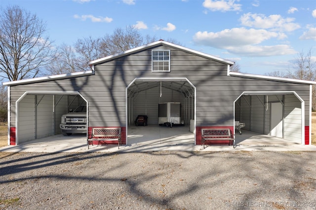 garage featuring a carport