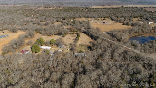 birds eye view of property featuring a rural view