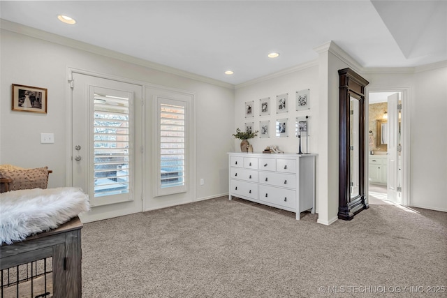 bedroom featuring light carpet, access to exterior, crown molding, and connected bathroom