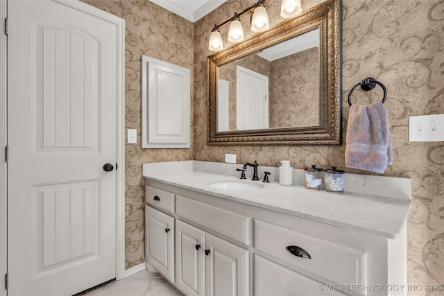 bathroom featuring vanity and crown molding