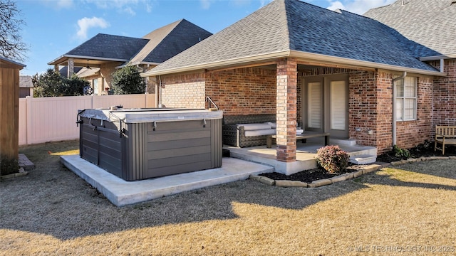 912 Dornick Dr, Ardmore, OK 73401 - view of patio / terrace with a hot tub