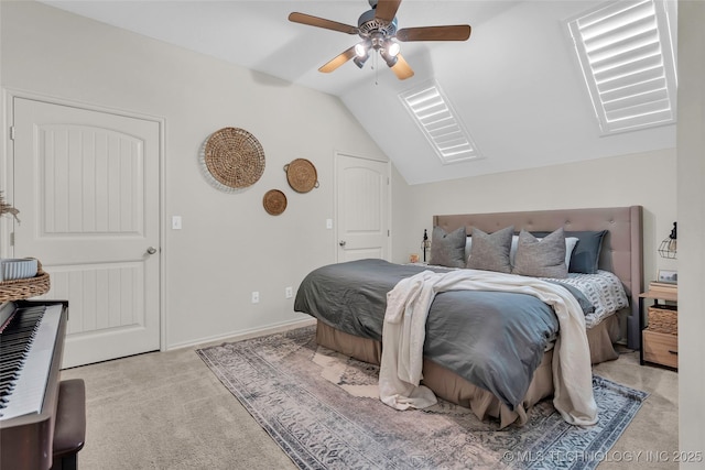 carpeted bedroom featuring ceiling fan and lofted ceiling