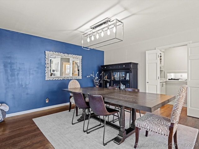 dining area featuring hardwood / wood-style flooring