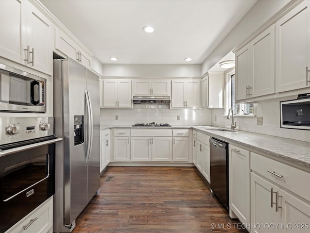 kitchen with white cabinets, sink, and stainless steel appliances