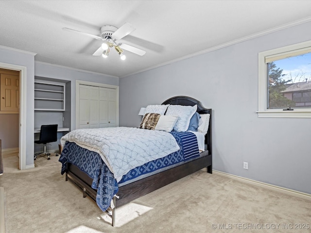 bedroom with light carpet, ceiling fan, ornamental molding, and a closet