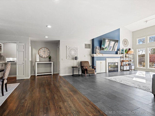 living room featuring dark hardwood / wood-style floors