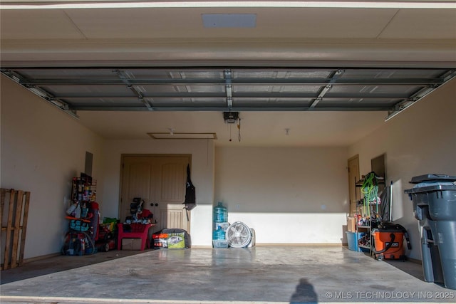 garage featuring a garage door opener