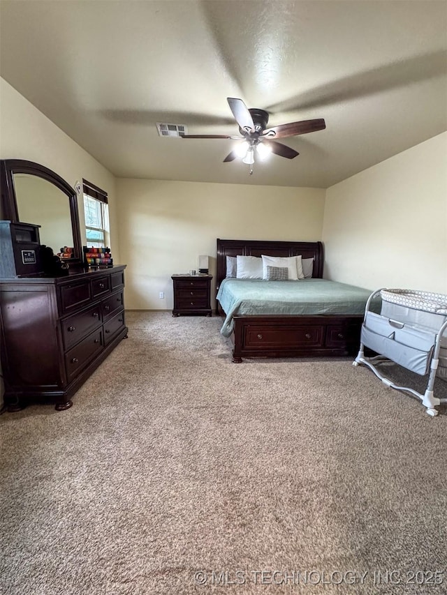 carpeted bedroom featuring ceiling fan