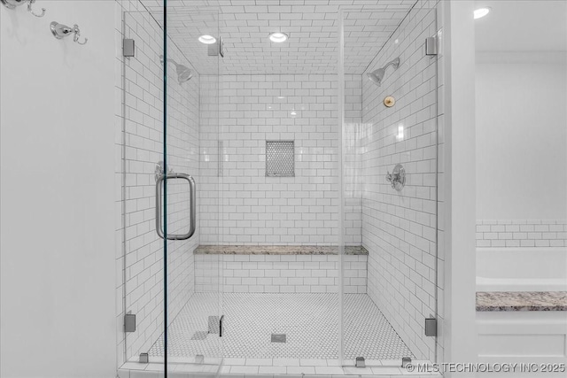 bathroom featuring walk in shower