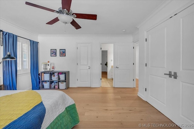 bedroom with ceiling fan, light hardwood / wood-style flooring, and ornamental molding