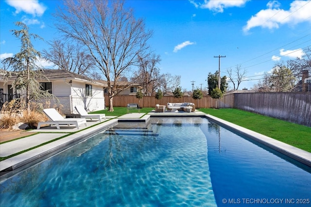 view of pool with a lawn and outdoor lounge area