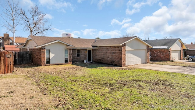 ranch-style house featuring a garage, a front lawn, and central AC