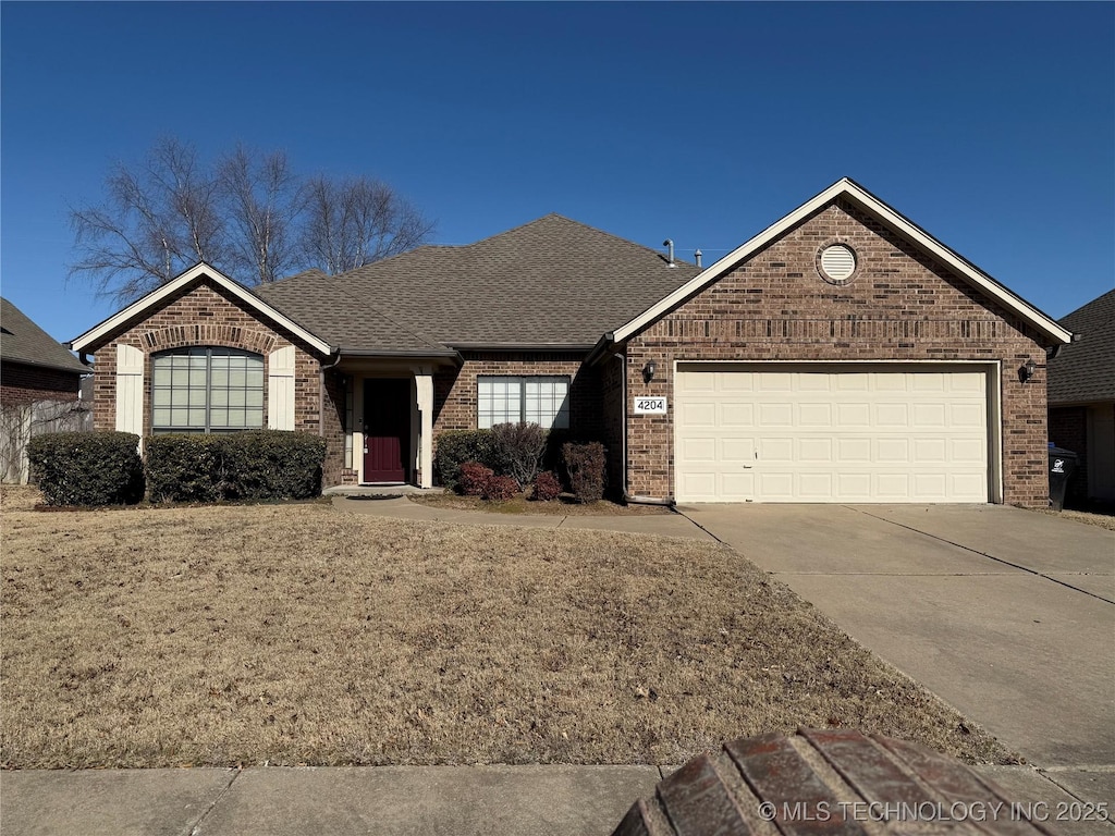 single story home featuring a garage