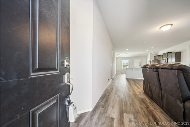 interior space with dark hardwood / wood-style floors