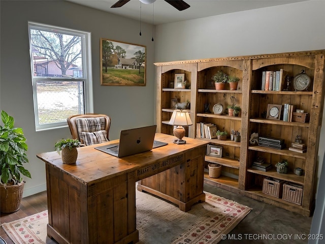 office with ceiling fan, a wealth of natural light, and hardwood / wood-style flooring