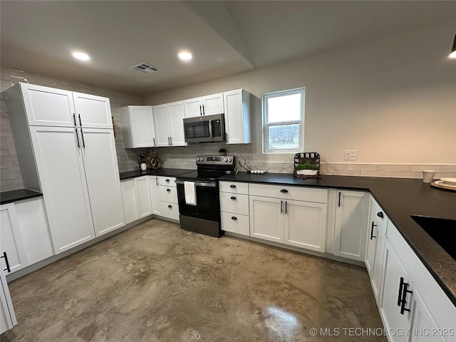 kitchen featuring backsplash, white cabinets, and stainless steel appliances