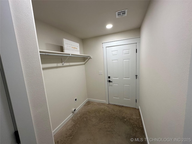 washroom featuring hookup for an electric dryer