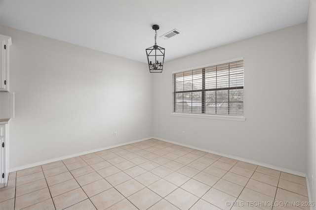 view of tiled spare room