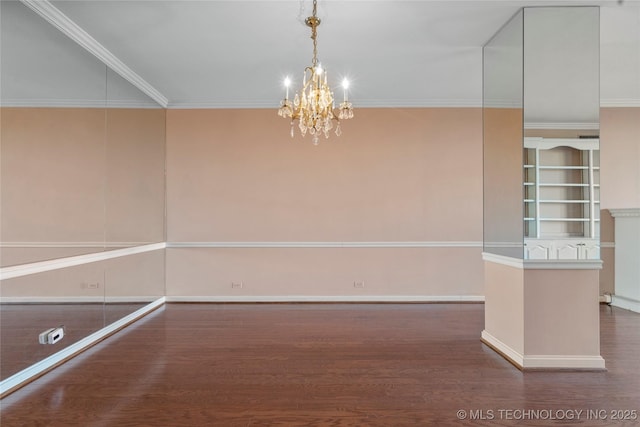 unfurnished room with dark hardwood / wood-style floors, crown molding, and an inviting chandelier